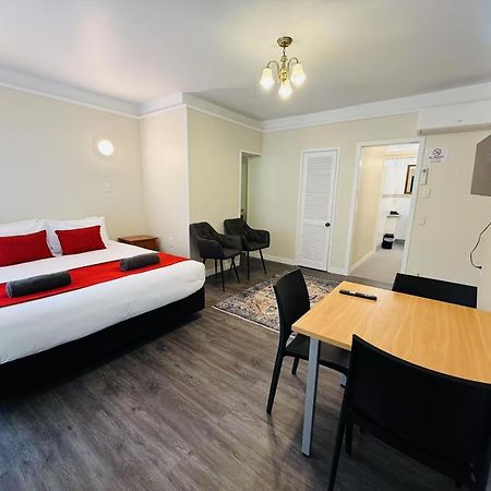 Colonial City Motel Hamilton Bagian luar foto