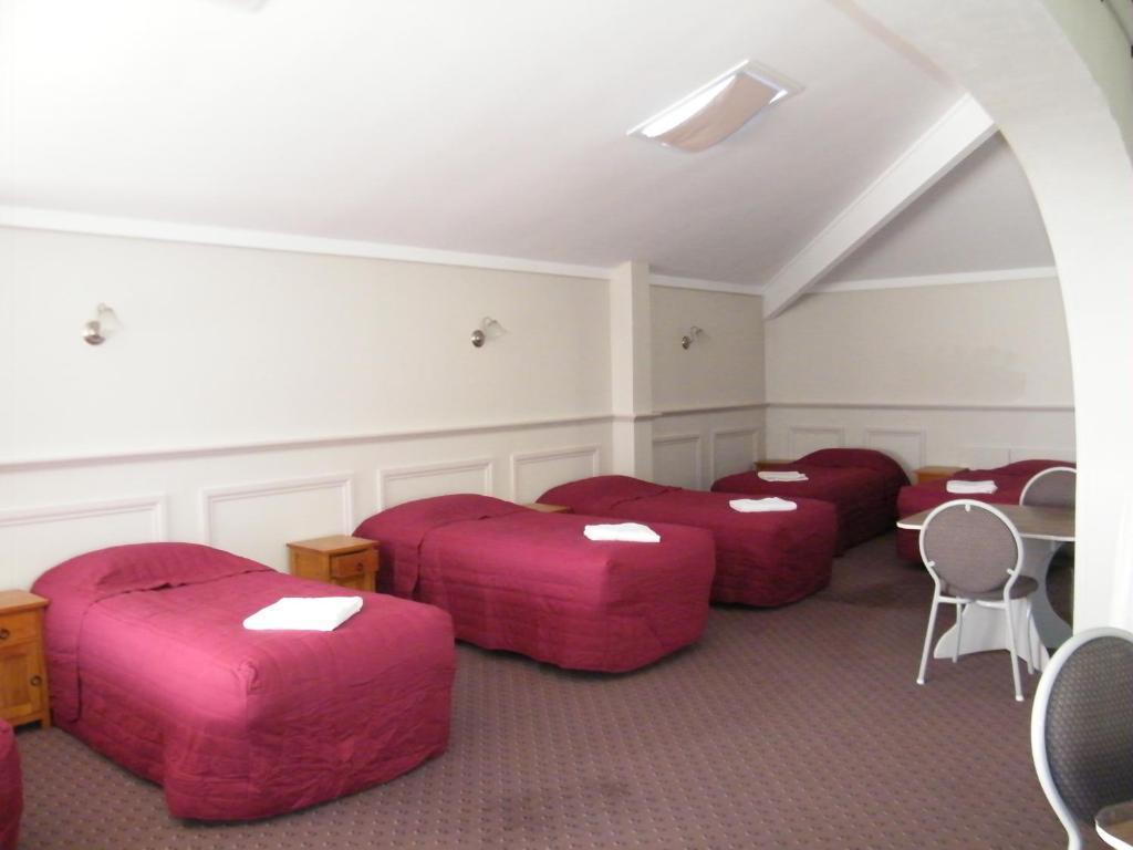 Colonial City Motel Hamilton Ruang foto